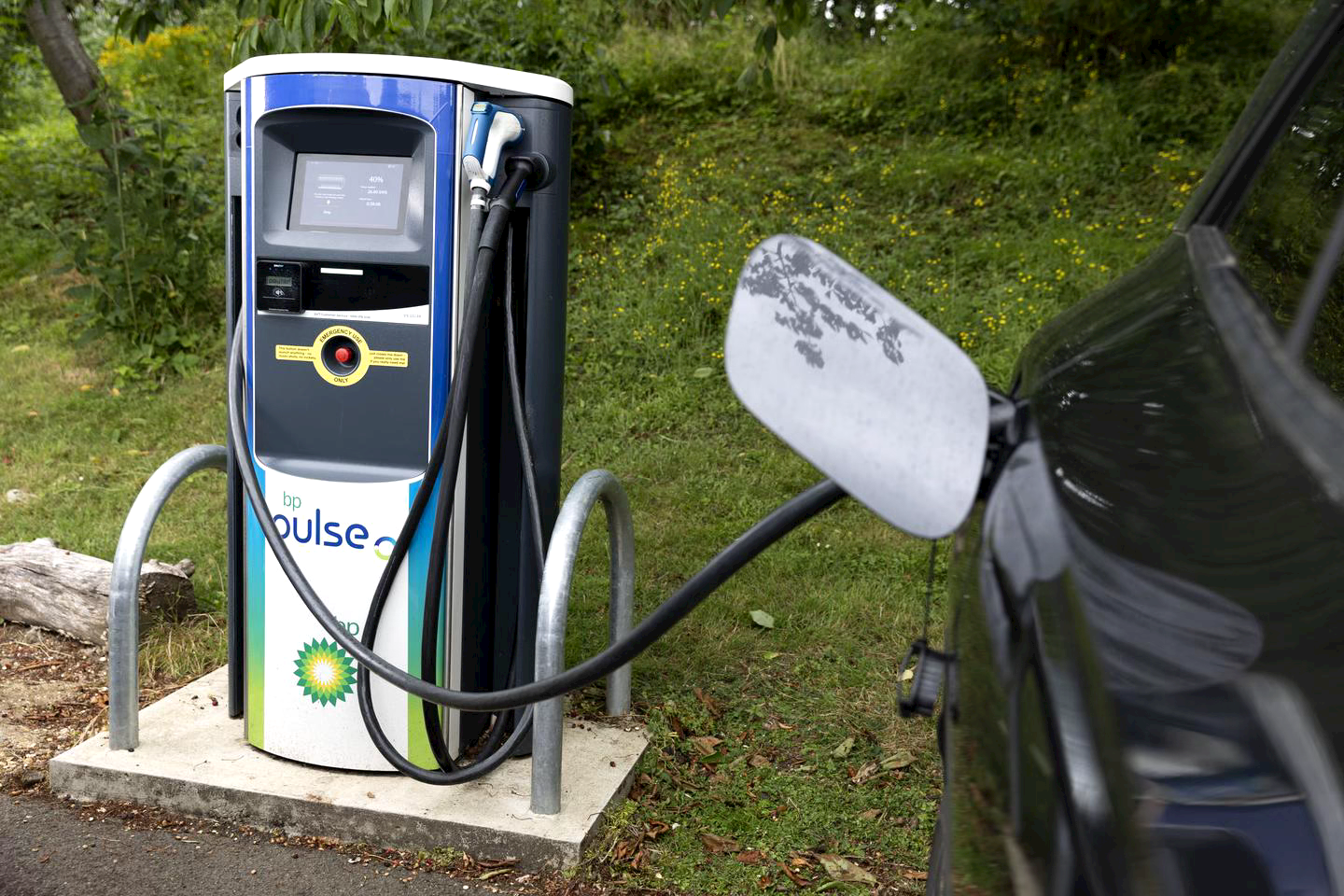 A bp pulse charge point charging an electric vehicle