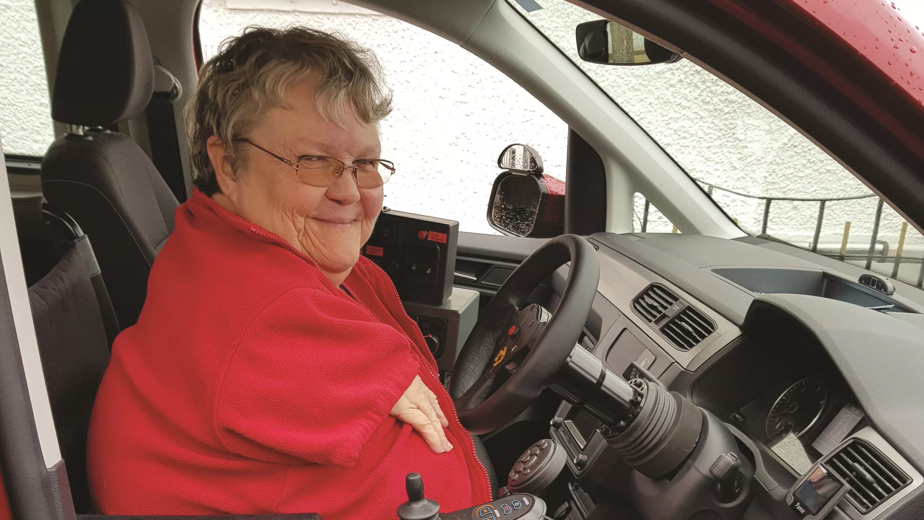 A person driving a Drive From Wheelchair Accessible Vehicle